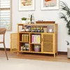 A bamboo storage cabinet with various items on its shelves, including jars, bottles, boxes, and a cup. Podgląd zdjęcia produktu