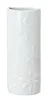 A white ceramic vase with embossed floral patterns. Podgląd zdjęcia produktu