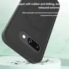A black phone case is shown at an angle, resting on a cracked white surface with a light green background. Produktbild-Vorschau