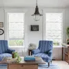 A living room scene with two chairs and a coffee table. Produktbild-Vorschau