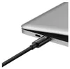 A close-up shot of a black USB-C cable plugged into a silver laptop. Anteprima dell’immagine prodotto