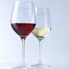 Two wine glasses, one with red wine and one with white wine, are shown against a light gray background. Podgląd zdjęcia produktu