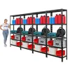 A woman stands next to a multi-shelf storage unit filled with various items. Produktbild-Vorschau