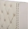 A close-up view of a tufted headboard with silver stud accents. Podgląd zdjęcia produktu