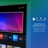 A television screen displaying a colorful abstract image, with app icons at the bottom. The right side of the image features marketing text and a logo. Produktbild-Vorschau