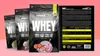 Multiple pouches of protein powder are displayed in a studio setting with a pink gradient background. Produktbild-Vorschau