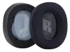 Two black ear pads for headphones are shown against a white background. Voir les images du produit