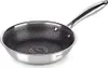 A stainless steel frying pan with a honeycomb pattern on the inside. Náhľad obrázku produktu