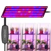 A grow light panel with a controller is shown above three small plant shelves, each containing two potted plants. Náhľad obrázku produktu