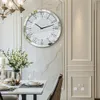 A dining room setting with a large wall clock as the focal point. Podgląd zdjęcia produktu
