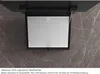 A close-up view of a range hood filter, mounted under a cabinet. Voir les images du produit