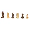 A collection of chess pieces on a white background. Podgląd zdjęcia produktu