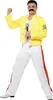 A man dressed as Freddie Mercury from Queen, holding a microphone and posing. Produktbild-Vorschau