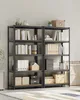 Two black metal shelving units filled with books, binders, and storage boxes, placed against a white brick wall. Produktbild-Vorschau