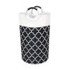 A tall, cylindrical laundry basket with a black and white geometric pattern. Produktbild-Vorschau