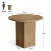 A diagram showing a small round dining table with dimensions and a human silhouette for scale. Produktbild-Vorschau
