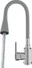 A kitchen faucet with a flexible gray spout and a chrome base, with water flowing from the spout. Podgląd zdjęcia produktu