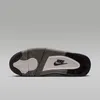 The underside of a Nike Air Jordan 4 Retro sneaker is shown against a plain gray background. Náhled obrázku produktu