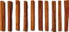 A collection of cinnamon sticks laid out on a white background. Podgląd zdjęcia produktu