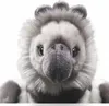 A close-up studio shot of a stuffed harpy eagle toy against a white background. Produktbild-Vorschau