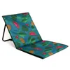 A foldable beach mat with a tropical fruit and leaf pattern. Produktbild-Vorschau