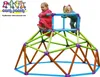 Two young children playing on a colorful geometric climbing structure. Anteprima dell’immagine prodotto