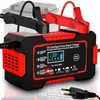 A car battery charger is shown connected to a car battery. Podgląd zdjęcia produktu