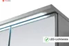 Close-up of the top edge of a gray cabinet with a mirrored door and integrated LED lighting. Produktbild-Vorschau