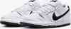 A pair of white Nike SB Dunk Low Pro sneakers with black accents, presented on a white background. Podgląd zdjęcia produktu