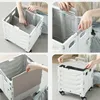 A collage of four images showing a person assembling and using a foldable shopping cart. Produktbild-Vorschau