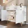 A white sideboard with gold legs and handles, open to reveal shelves with decorative items. Produktbild-Vorschau