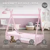 A pink wooden children's bed with a teepee frame, set up in a nursery room with toys and decor. Náhľad obrázku produktu