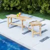 A wooden bench placed on a tiled patio next to a swimming pool, with drinks and a blanket on it. Anteprima dell’immagine prodotto