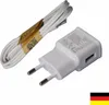 A white USB charger and a white USB cable are laid out on a white background. Produktbild-Vorschau