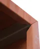 A close-up view of the corner of a Corten steel firewood rack, showing the weathered texture and construction. Produktbild-Vorschau