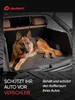 A German Shepherd dog lies on a car's trunk mat. Náhľad obrázku produktu