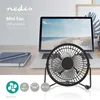 A mini fan on a desk next to a laptop and a notebook. Produktbild-Vorschau