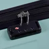 A close-up of a luggage combination lock and zipper. Náhľad obrázku produktu