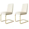 Two beige upholstered chairs with gold metal legs are shown against a white background. Náhľad obrázku produktu