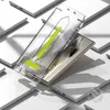 A clear plastic installation guide for a screen protector is shown over a smartphone, with multiple phones in the background. Produktbild-Vorschau