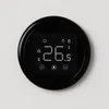 A digital thermostat mounted on a white wall. Náhled obrázku produktu