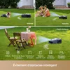 Collage of images showing a robotic lawnmower interacting with animals, people, and static objects, with icons and text describing its features. Produktbild-Vorschau