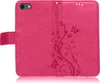 A pink flip case for a smartphone, open and lying flat. Produktbild-Vorschau