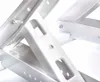 Close-up view of white metal brackets, likely for an air conditioner or similar equipment. Produktbild-Vorschau