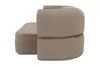 A taupe-colored sofa with an ottoman, shown from a side angle against a white background. Produktbild-Vorschau