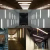 A collage of images showing various industrial and commercial lighting installations, including fluorescent tube lights on ceilings, walls, and in hallways. Anteprima dell’immagine prodotto