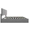 A side view of a grey upholstered bed frame with a diamond-stitched headboard and a slatted mattress support. Náhľad obrázku produktu