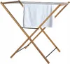 A wooden drying rack with a white towel draped over it, set against a white background. Podgląd zdjęcia produktu
