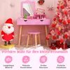 A pink children's vanity set with a stool, decorated for Christmas with a Santa figure and a pink Christmas tree. Produktbild-Vorschau