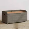 A storage bench with a wooden top on a wooden deck. Anteprima dell’immagine prodotto